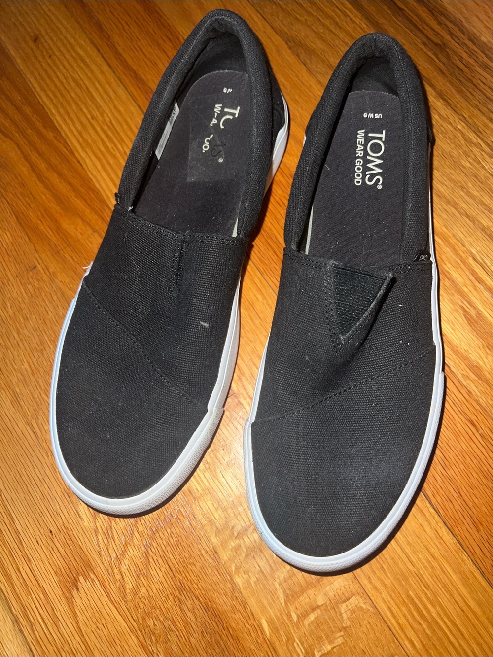 TOMS Black Canvas Slip-On Sneakers with White Sole